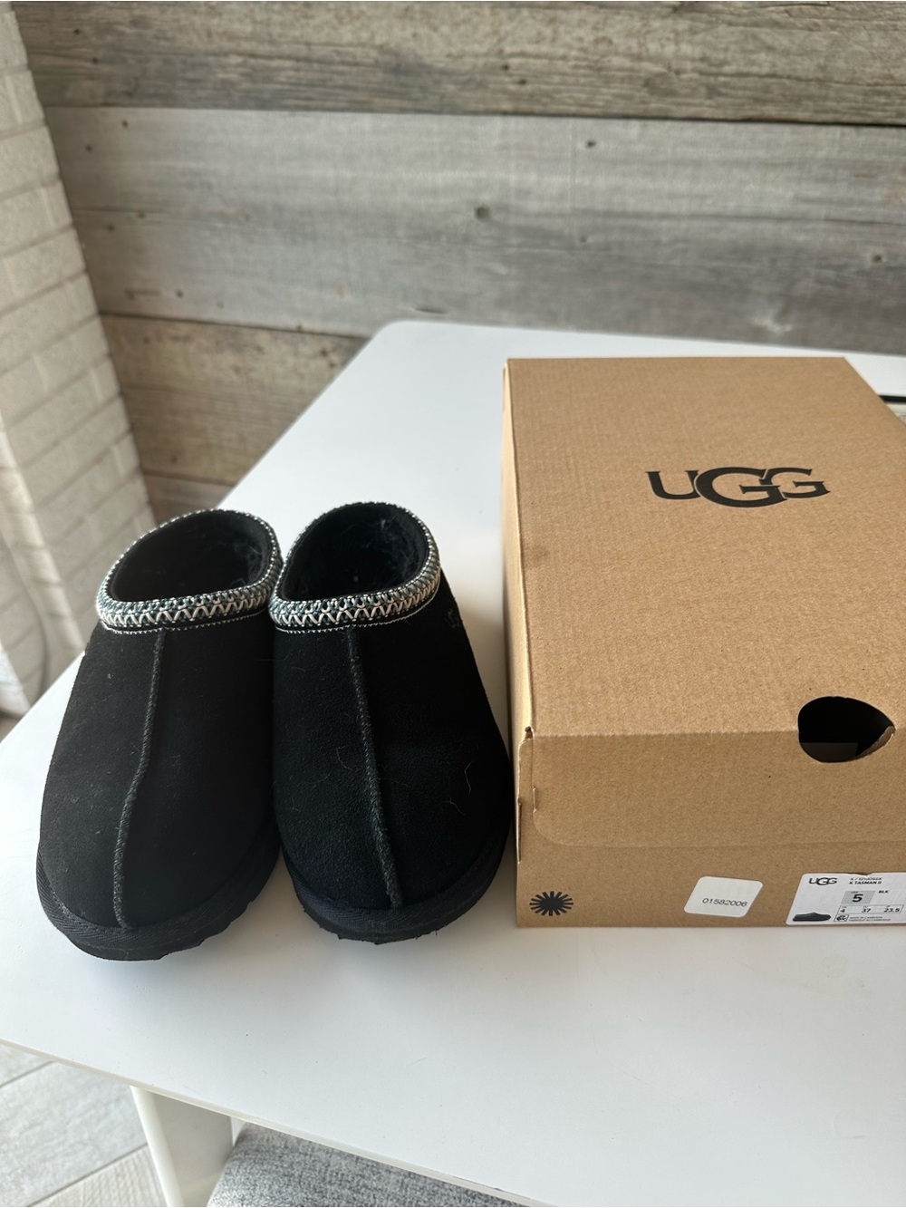 UGG Kids Black Suede Slip-On Clogs with Decorative Trim